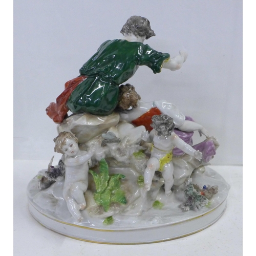 620 - A Dresden porcelain figure group, sleeping girl, young man, dog, sheep and birds, c1890, (some a/f, ... 