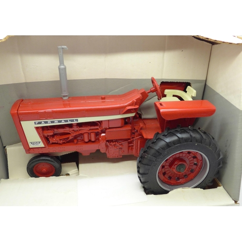 623 - A Farmall 706 die-cast metal tractor by Ertl