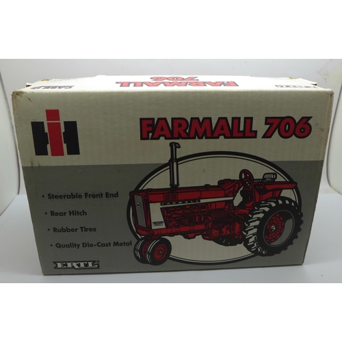 623 - A Farmall 706 die-cast metal tractor by Ertl