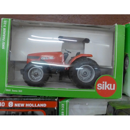 626 - Five model tractors, Siku, Ertl and Britains, boxed