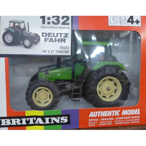 626 - Five model tractors, Siku, Ertl and Britains, boxed