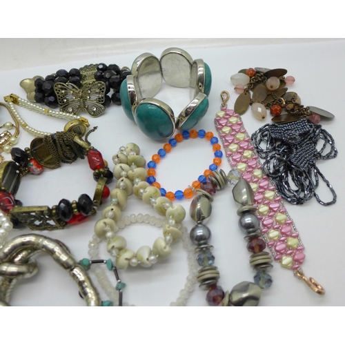 647 - Nineteen costume bracelets