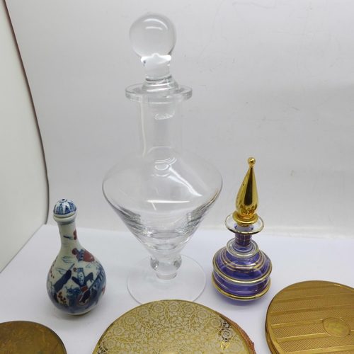 649 - Seven compacts and three perfume bottles