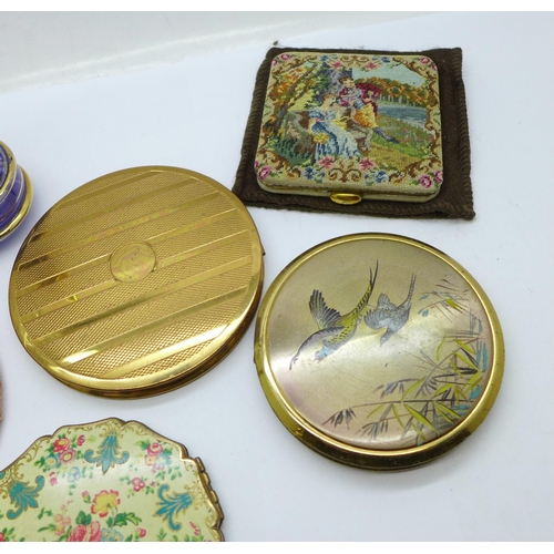 649 - Seven compacts and three perfume bottles