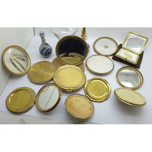 649 - Seven compacts and three perfume bottles