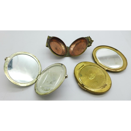 650 - A shagreen compact, a plated compact and one other brass and copper hinged box or compact