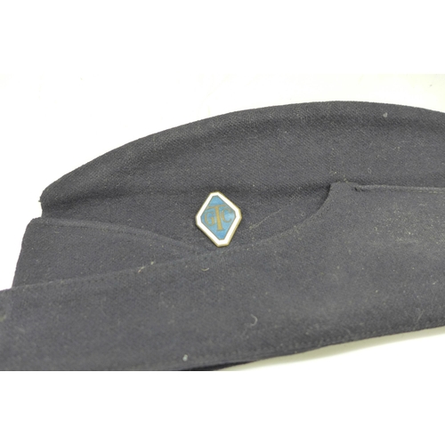 652 - An RAF cap with badge and one other cap