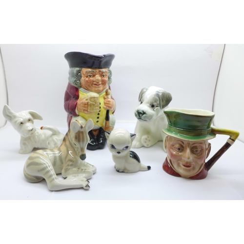 654 - A Russian figure of a dog, a Royal Doulton Jolly Toby, etc. (6)