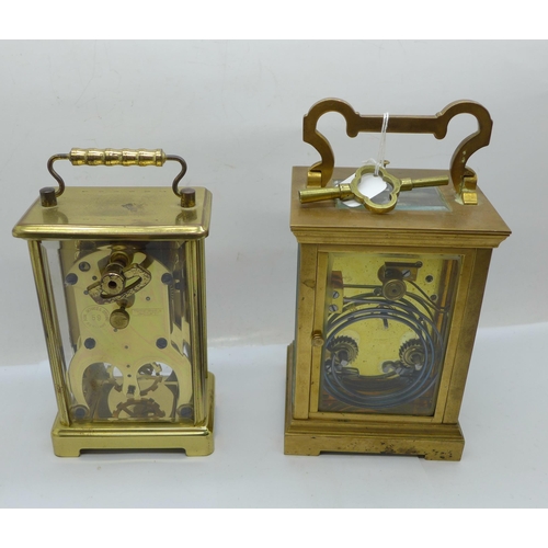 658 - A brass and four glass sided carriage clock with key, dial a/f, and a Schatz 8 Day clock