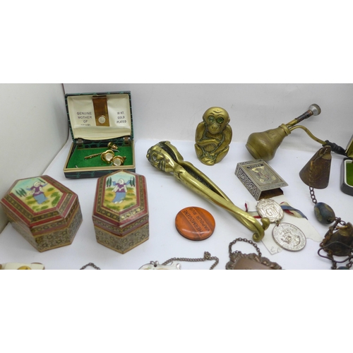 664 - Assorted items; brass nutcrackers, cufflinks, boxes, etc.