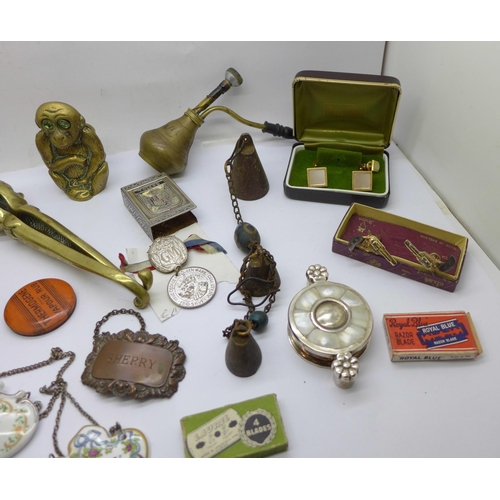 664 - Assorted items; brass nutcrackers, cufflinks, boxes, etc.