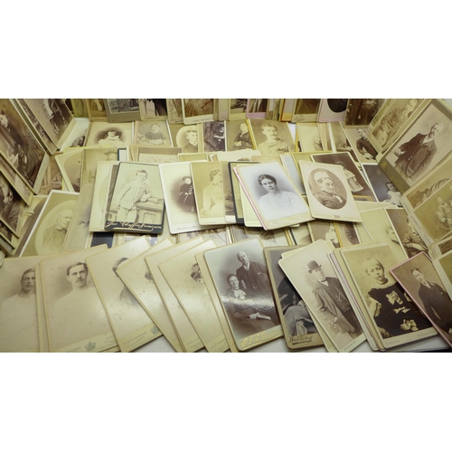 668 - A box of 300 Victorian carte de visite photographs