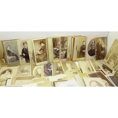 668 - A box of 300 Victorian carte de visite photographs