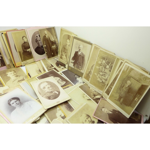 668 - A box of 300 Victorian carte de visite photographs