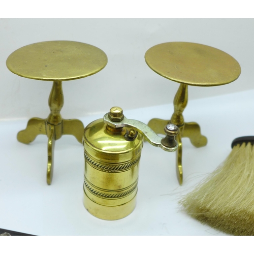 704 - Two novelty mini brass tables, a Buddha figure, a spectacle case, etc.