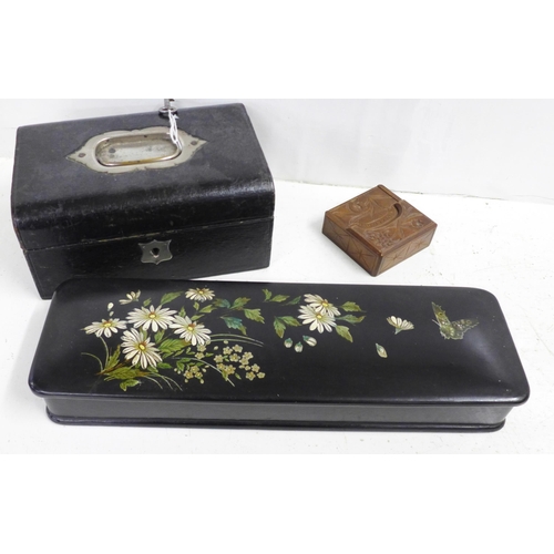 709 - A lacquered jewellery box, a glove box and a watch stand