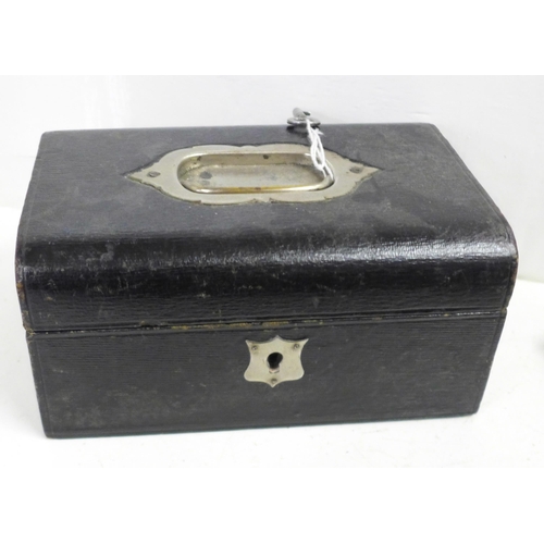 709 - A lacquered jewellery box, a glove box and a watch stand