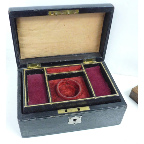 709 - A lacquered jewellery box, a glove box and a watch stand