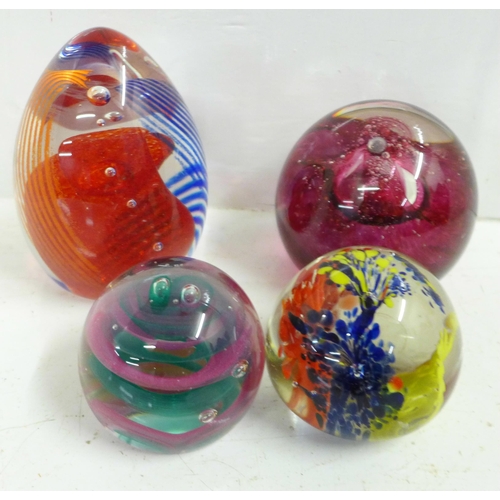 722 - Five glass paperweights including Caithness