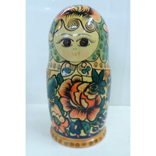 728 - A large Russian doll, fifteen stacking dolls