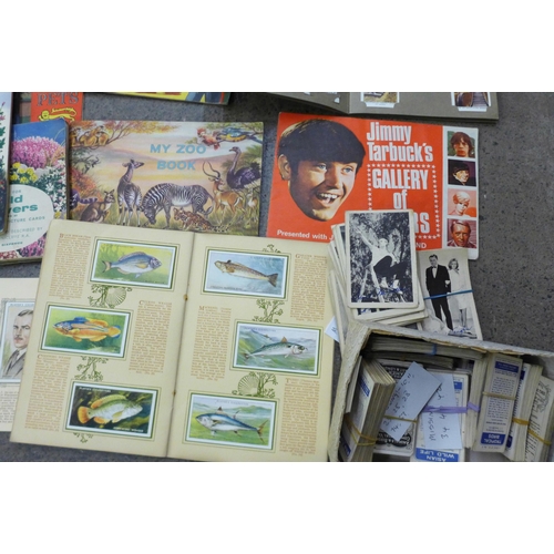 738 - A collection of cigarette and tea cards, some part albums and a collection of loose cigarette and te... 