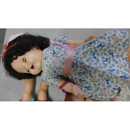 757 - A box of vintage dolls, three dressed baby BND dolls, a large and a small Pedigree doll and a Palito... 