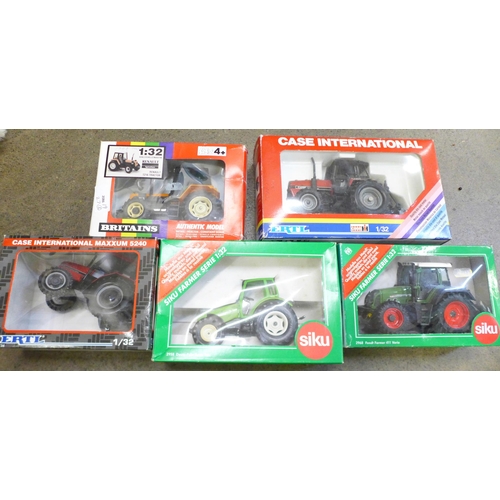 785 - Five model tractors, boxed, Ertl, Siku and Britains