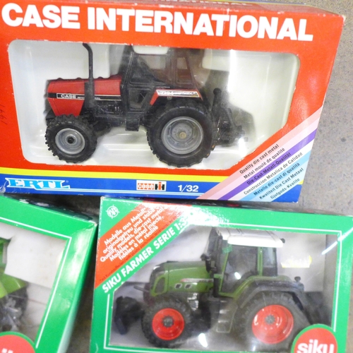 785 - Five model tractors, boxed, Ertl, Siku and Britains