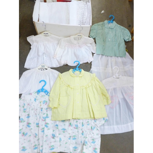 798 - A collection of linen and 1940's/50's baby wear dresses