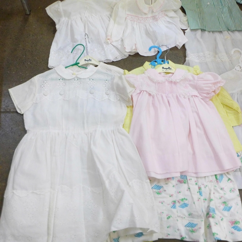 798 - A collection of linen and 1940's/50's baby wear dresses