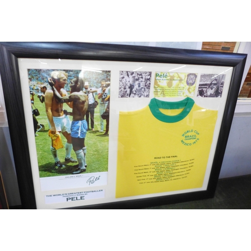 803 - A framed replica Brazil 1970 Mexico World Cup football shirt with Pele signature, with certificate o... 