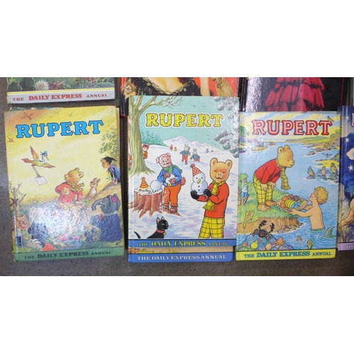 808 - A collection of Rupert annuals, a Blue Peter annual, Muppets, etc.