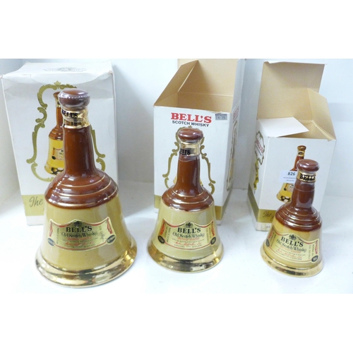 826 - Three graduated Bell's Scotch Whisky bottles with contents