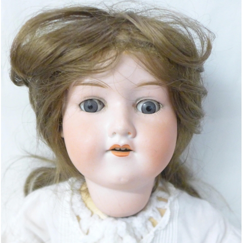 828 - An Armand Marseille doll