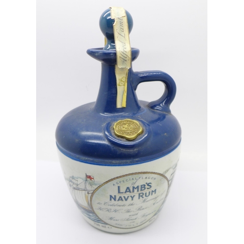 830 - A Lamb's Navy Rum bottle with contents