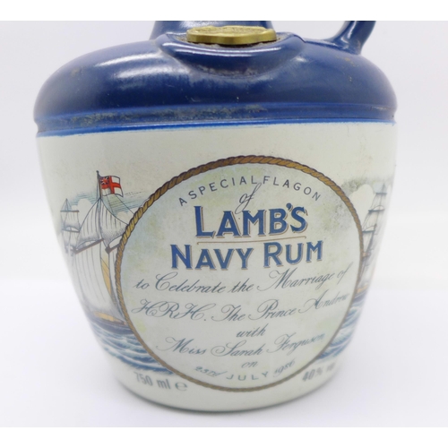 830 - A Lamb's Navy Rum bottle with contents