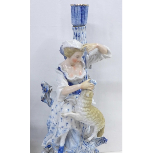 832 - A pair of blue porcelain candlesticks, shepherd and shepherdess, some a/f