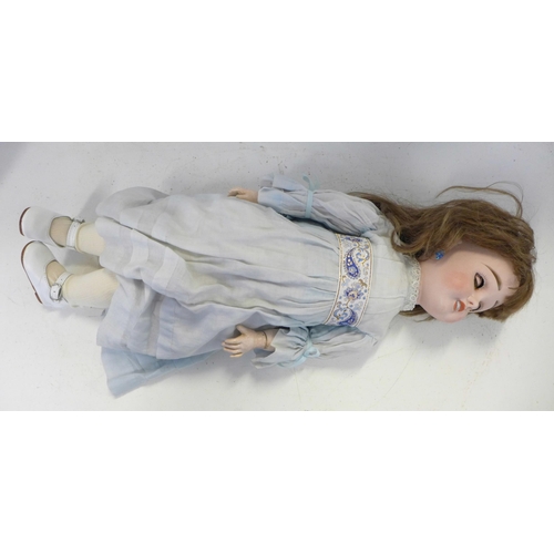 834 - A French Limoges bisque head doll with deep violet sleep eyes, Limoges 9 identification mark, right ... 