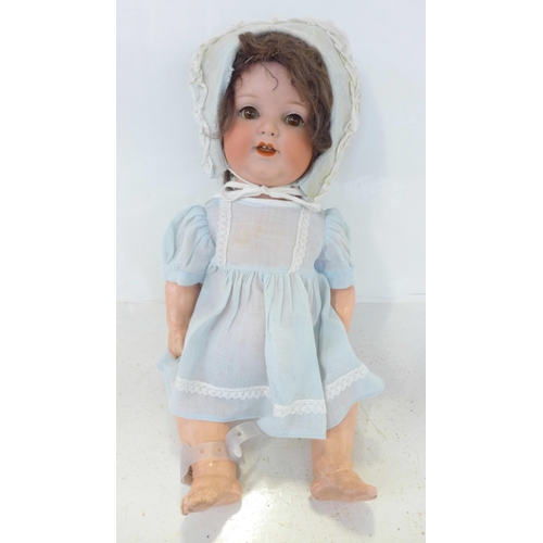 837 - A German Armand Marseille bisque head doll with brown sleep eyes, 996 A3M identification mark, circa... 