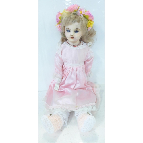 838 - A German wax over composition doll, one eye deteriorated, head restored, circa 1860-1890, 50cm