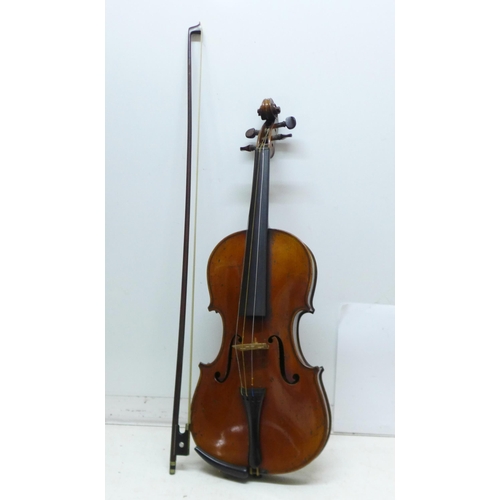 846 - A violin, the back 335mm without button, no paper label, with bow and case