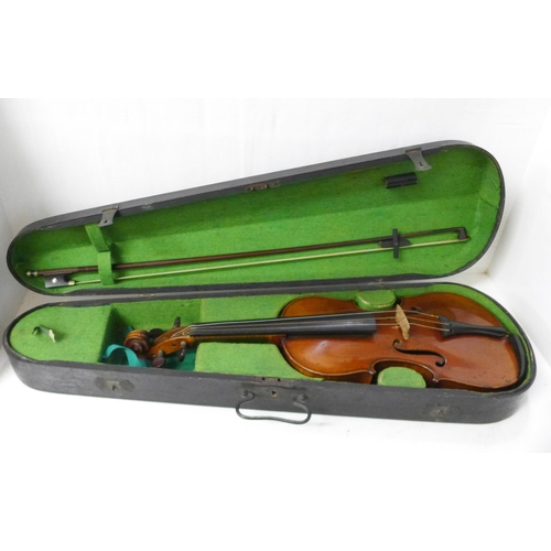 846 - A violin, the back 335mm without button, no paper label, with bow and case