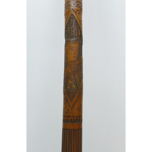 854 - A bamboo walking stick with Japanese carvings, Geisha girls, 89cm