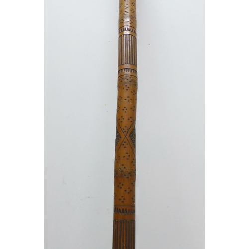 854 - A bamboo walking stick with Japanese carvings, Geisha girls, 89cm