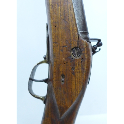 860 - An 18th Century flintlock blunderbuss, 48mm wide at mouth, the lock plate engraved Staples, brass tr... 