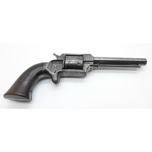 863 - A 19th Century revolver handgun, indistinct four digit number on the bottom of the grip, ??74, lengt... 