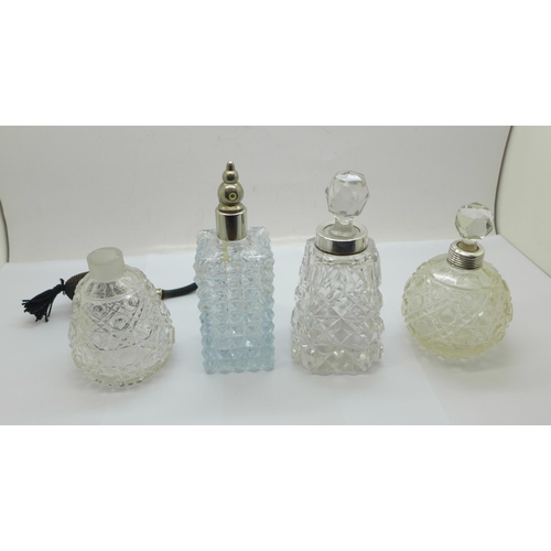 874 - Four glass scent bottles, (one lacking stopper, one lacking screw top with replacement stopper)