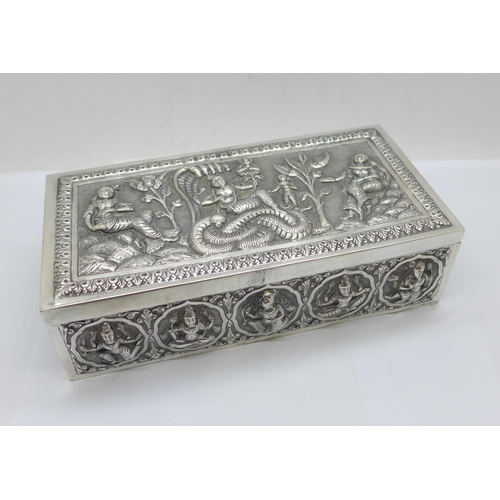 878 - An Eastern white metal cigarette box, total weight 395g, width 18cm, a/f, dented