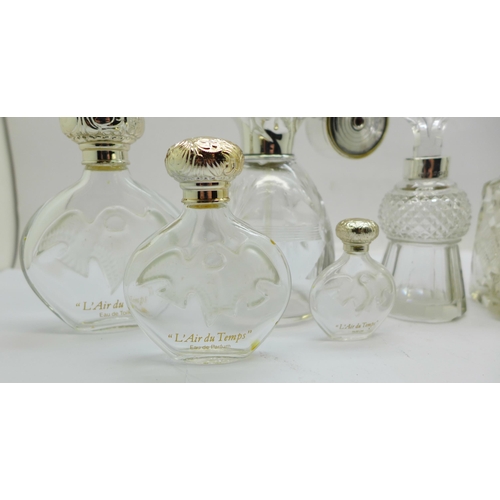 884 - Three silver mounted glass scent bottles including one thistle shaped and hallmarked Birmingham 1900... 