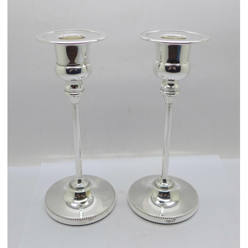 888 - A pair of Arthur Price silver plated candlesticks, boxed